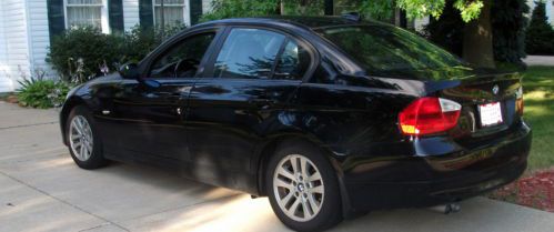 Bmw 328 i   hot car black on black with 6 speed.. priced to sell