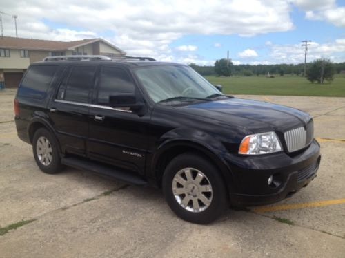 2004 lincoln navigator black luxury car tan interior