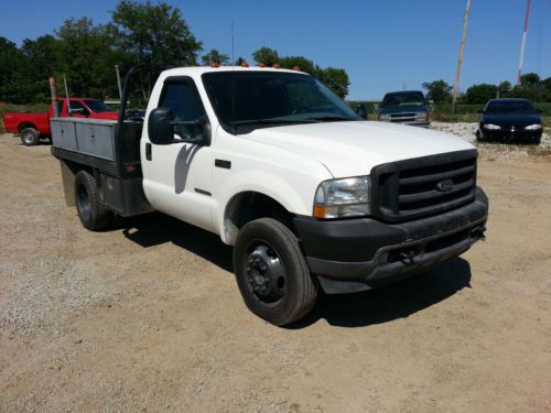 2002 f 450 xl 2wd 7.3 diesel 6 spd  flat bed gooseneck ready to work