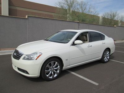 2006 white v6 automatic leather navigation sunroof miles:69k sedan