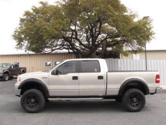 Lifted 35's lariat leather 6 cd sirius sunroof 5.4l triton v8 4x4 fuel alloys