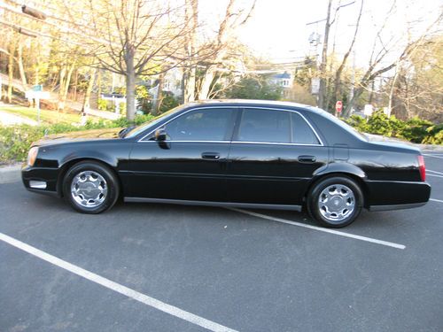 Cadillac deville loaded  black on black