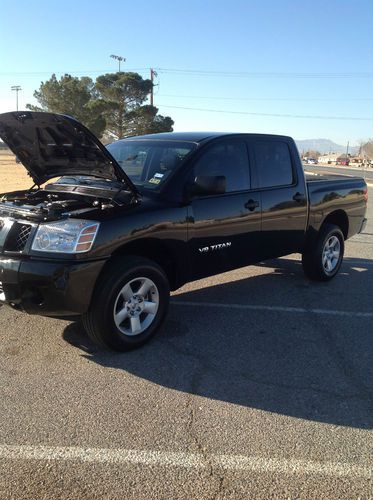 Nissan titan 4x4 (low mileage)