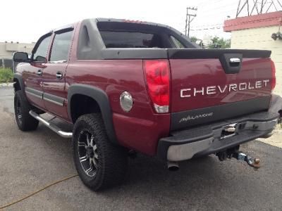 Lifted chevy avalanche w/ custom entertainment system