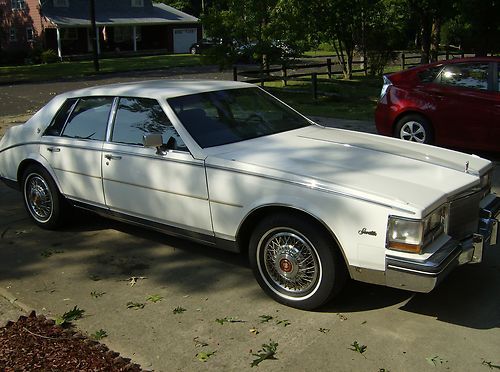 1985 cadillac seville,,white ext/blue/int