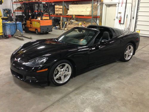 Black 2005 chevrolet corvette 25,000 miles