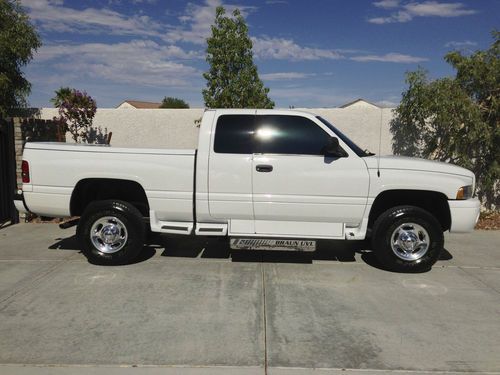 2002 dodge ram 2500 quad cab (braun uvl sport lift)