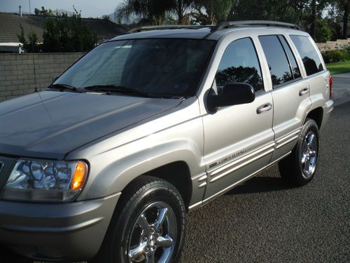 2002jeep grand cherokee limited 4x4 v8 silver &amp; black