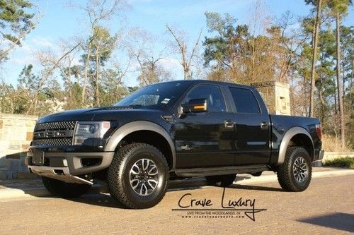 Ford f150 raptor,svt. 4x4 clean 1,300 miles, black on black, sunroof