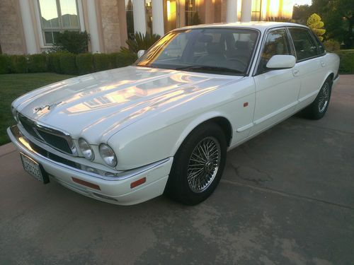 Clean low miles 1997 white and beige jaguar xj6 4.0 kelley blue book is $6500