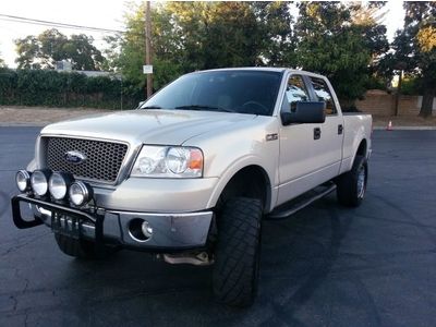 Lariat blk leathr. smokestone metallic, many off road and electronic upgrades