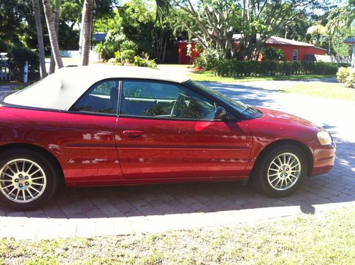 Red 2 door convertible - previous owner was a retiree