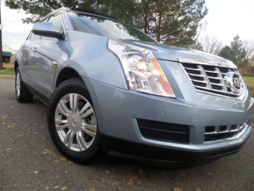 2013 cadillac srx luxury /navigation/ panoramic roof/ rear camera/ no reserve