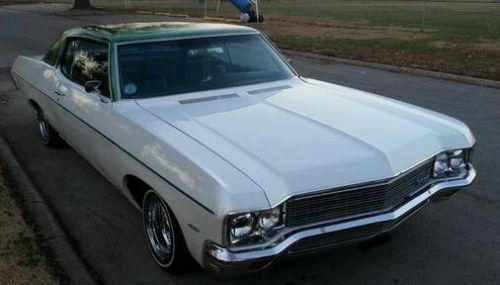 White 1970 hard top custom chevy 2 door coupe impala