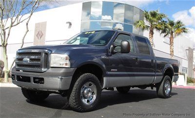 2005 ford super duty f-250 xlt crew cab 4x4 blue/silver exterior