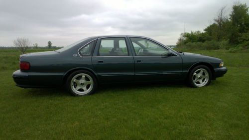 1996 impala ss, dark grey green metallic, very low miles, all stock condition