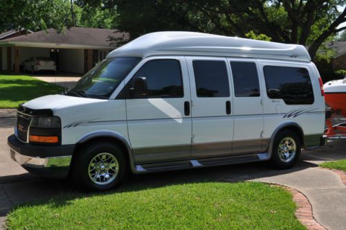 2007 gmc savana high top custom van by regency. white with grey leather interior