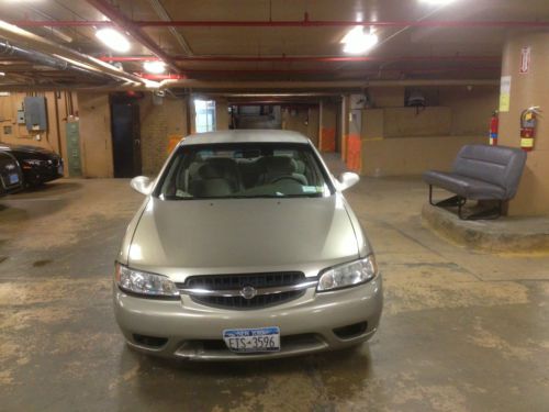 2001nissan altima, 4dr 4 doors, new battery, brake plate, tires, catalytic convt