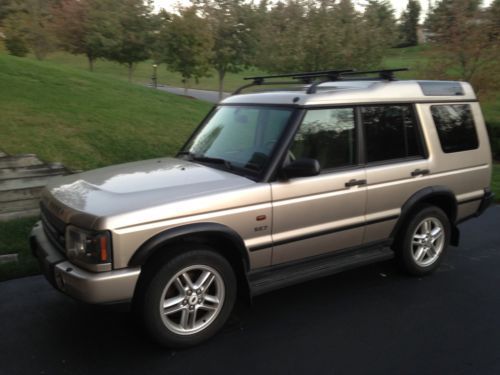 Tan exterior, tan leather interior, good overall condition
