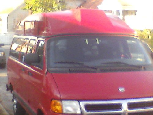 Red handicap van 79850 miles