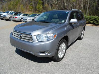 3.3l v-6 cyl hybrid clean carfax nav 3 row leather seating awd well maintained