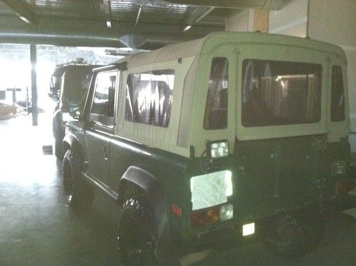 1994 defender 90,very clean,custom badger soft top,garmin gps,true miles unkown