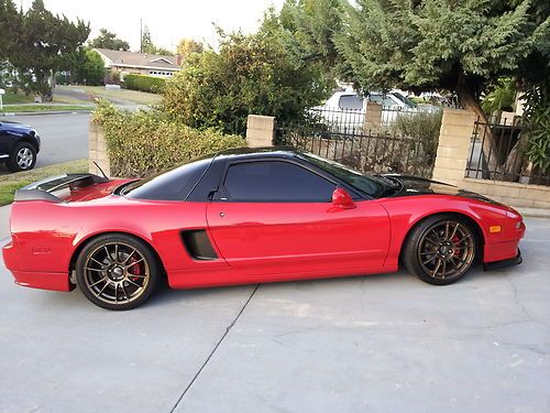 92 acura nsx, comptech supercharged + many mods. 420bhp. lots of carbon fiber
