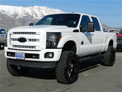 Crew cab lariat 4x4 powerstroke diesel custom new lift 22 wheels nav roof loaded