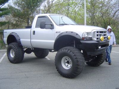 Custom monster lifted ford 4x4 super duty show winner driven on street awesome
