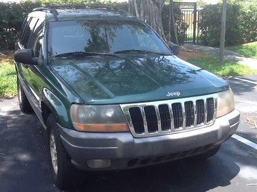 Good condition dark green jeep cherokee.