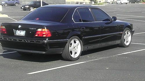 Bmw 740i black, automatic and manuel shift, over 250k miles