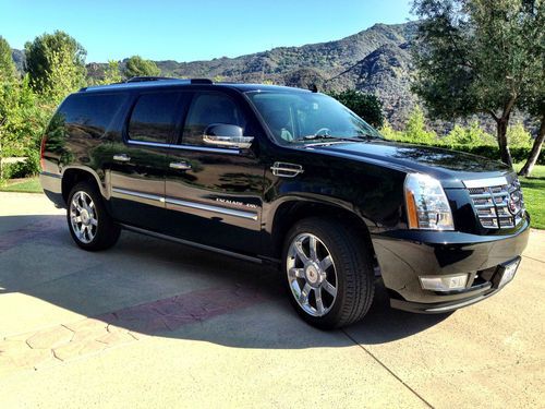 Cadillac escalade 2010 6,800 miles-- custom executive limo interior--black/black