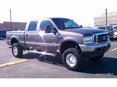 2004 Lariat FX4 sunroof 3 inch lift 4wd 4x4 hard tonneau cover leather, image 2