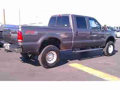 2004 Lariat FX4 sunroof 3 inch lift 4wd 4x4 hard tonneau cover leather, image 4