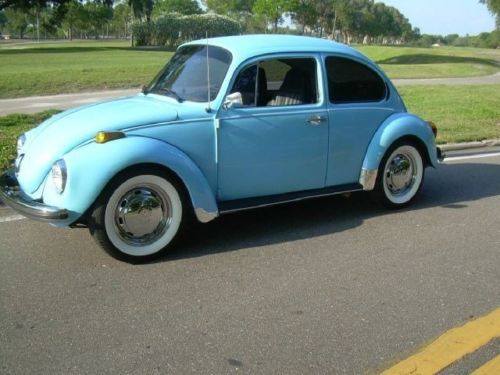 Cool v-dub beetle, 4 speed, light blue, chrome wheels, white wall tires