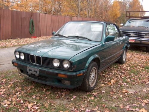 1992 bmw 325i convertible damage on rear quarter and the front. please view pic.