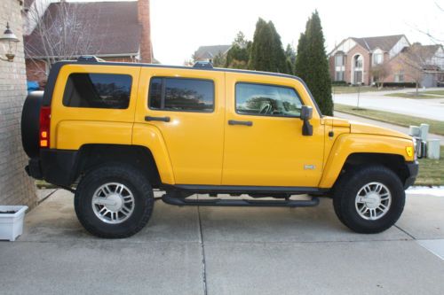 2006 hummer h3 suv, 50k miles, yellow w/ebony interior, clean carfax, garaged