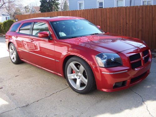 Beautiful inferno red magnum srt8 flowmaster exhaust diablosport predator tuner