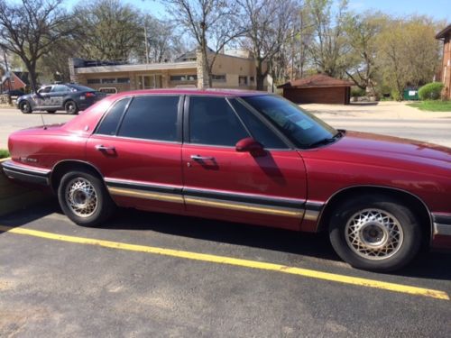 Burgundy, cloth seats, cd player, tinted windows