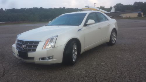 2009 cadillac cts premium edition, white diamond, still under factory warranty!