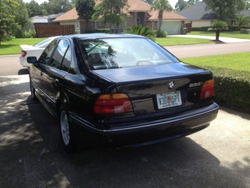 Black every available option black leather seats, sun roof excellent condition