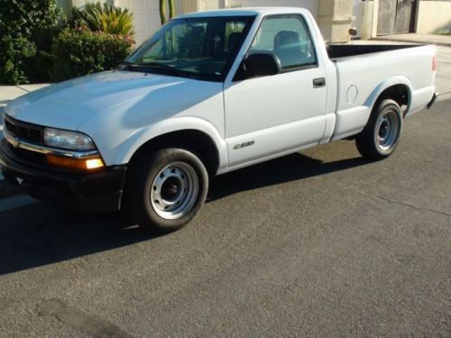 2002 ,white ,  clean, air conditioning , bed liner,  ladder rack