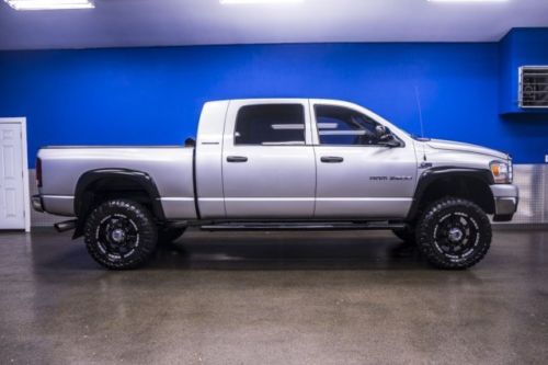 Lifted 5.9l cummins diesel mega cab bed liner running boards pwr adj driver seat