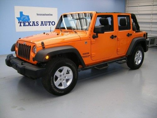 We finance!!  2012 jeep wrangler unlimited sport 4x4 auto hard top a/c cd 17 rim