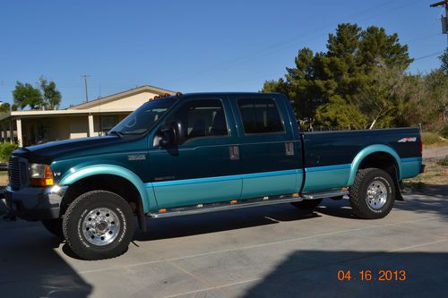 1999 f350 4x4 low miles diesel srw crew cab long bed 69000 miles!!