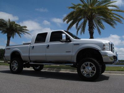 Ford f250 superduty diesel fx4 procomp lift with new 20" chrome wheels and tires