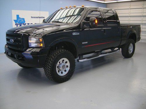 We finance!!!  2007 ford f-350 crew lariat outlaw 4x4 diesel auto lift 6cd!!!