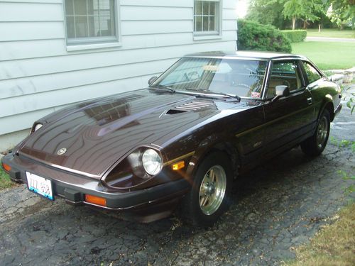 1982 datsun 280zx 2+2,  brwn wi gold pin striping, 5spd, 6cyl, 135,000mi,1owner