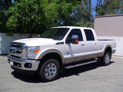 Lariat 4x4 powerstroke diesel  owner's demo.   msrp was $58015  mint condition