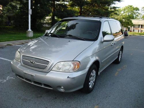 2005 kia sedona lx,,auto,cd,7 pass,loaded,great van,no reserve!!!!!